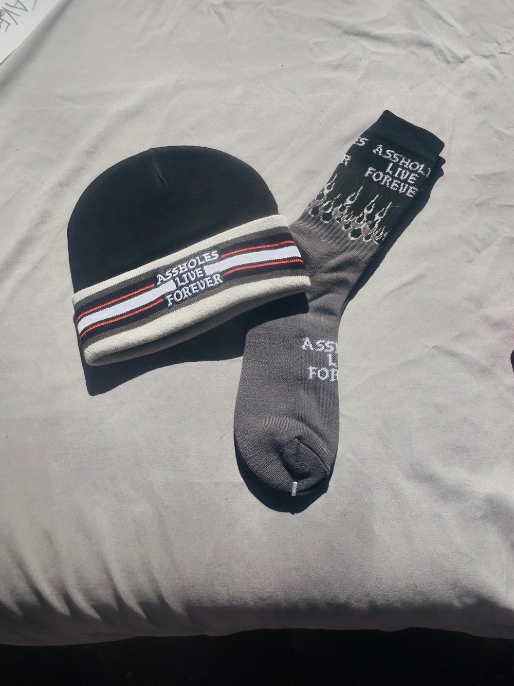 Black, Orange & Gray Beanie and Sock with Set w/ Flames 'Assholes Live Forever'